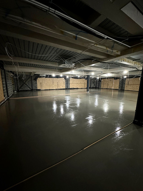 Liquid screed poured in a London basement conversion