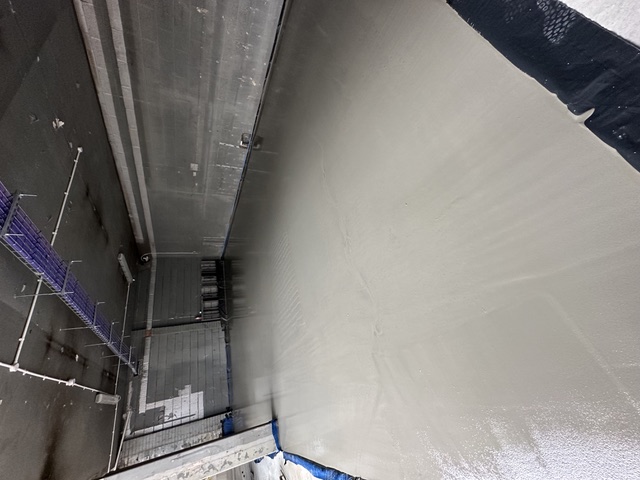 Screed poured in a plant room with block walls